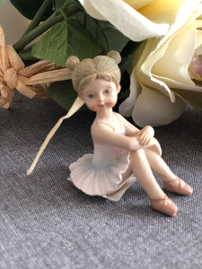 Ballet girl figurines.